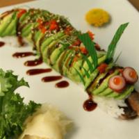 Dragon Roll · Eight pieces of eel and cucumber roll covered with sliced avocado. 