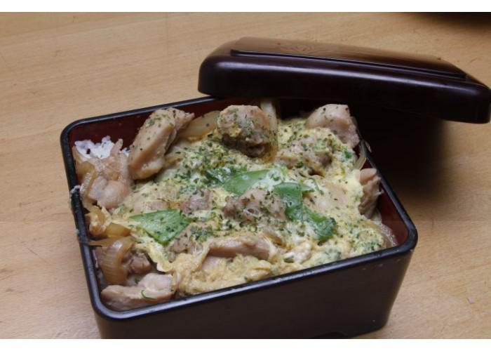 Oyakodon · Chicken and egg. Served over rice with miso soup. 