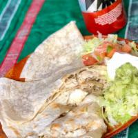 Quesadilla -traditional chicken · Large flour tortilla folded over chicken and melted jack cheese; topped with lettuce, pico d...