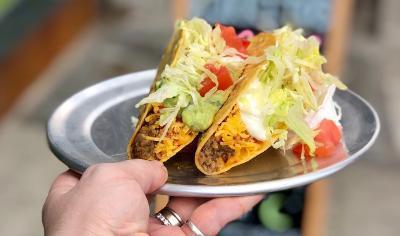 Crunchy Taco -ground beef · Crispy corn taco shell with ground beef, cheddar cheese, mild sauce, lettuce and tomato.