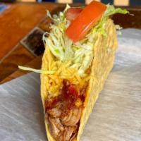 Crunchy Taco -chipotle chicken · Crispy corn taco shell with shredded chicken (simmered in chipotle sauce), cheddar cheese, m...
