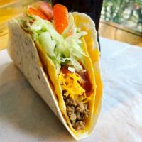 Queso Loco -ground beef · Soft flour tortilla with melted cheddar cheese wrapped around a crunchy ground beef taco.