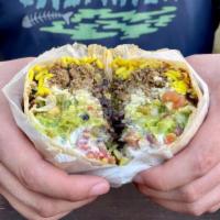 Burrito Grande -ground beef · Big Mission-style burrito. Large flour tortilla stuffed with ground beef, rice, black beans,...