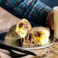 Burrito Grande -chipotle chicken · Big Mission-style burrito. Large flour tortilla stuffed with chipotle chicken, rice, black b...