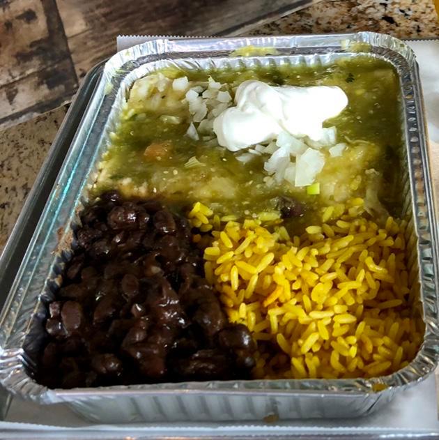 Traditional Enchiladas -pork carnitas · 2 corn tortillas rolled with jack cheese and pork carnitas, smothered in red or green sauce topped with more cheese, onions and sour cream. Served with rice & black beans on the side.