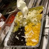 Roasted Veggie Traditional Enchiladas · Two enchiladas rolled with Monetery jack cheese and smothered in your choice of red or green...