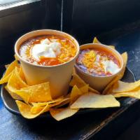 Chili Loco -beef · Hearty ground beef chili topped with cheddar cheese, diced onions and sour cream. Served wit...