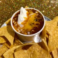 Chili Loco -veggie 3-bean · Hearty 3-bean chipotle chili topped with cheddar cheese, diced onions and sour cream. Served...