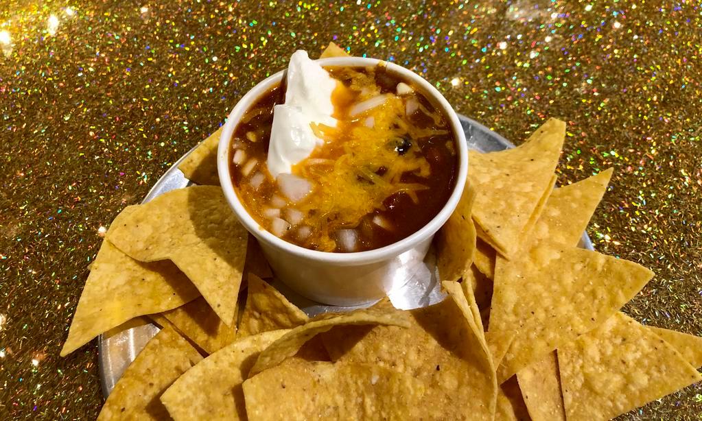 Chili Loco -veggie 3-bean · Hearty 3-bean chipotle chili topped with cheddar cheese, diced onions and sour cream. Served with tortilla chips. (vegetarian)