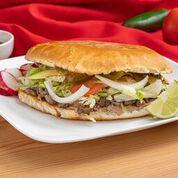 Asada Torta · Steak. Served with mayonnaise, beans, cilantro, onion, tomato, lettuce, avocado and Mexican cheese.