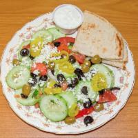 Large Cucumber Salad · Sliced cucumber with tomatoes, onions and green pepper mixed with our seasonings and vinegar.
