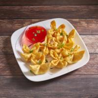 Crab Rangoon · 8 Pieces. Served with sweet and sour sauce.