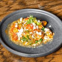 Shrimp Santorini · Pan seared in ouzo, tomato sauce, orzo, feta, dill.