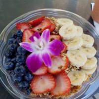 Brazilian · Organic acai guarana, mixed with banana, mix-berries and almond milk.
  Topped: granola, str...