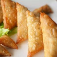 Triangles of Love - Lamb · Lamb battered, and covered with spices and deep-fried.