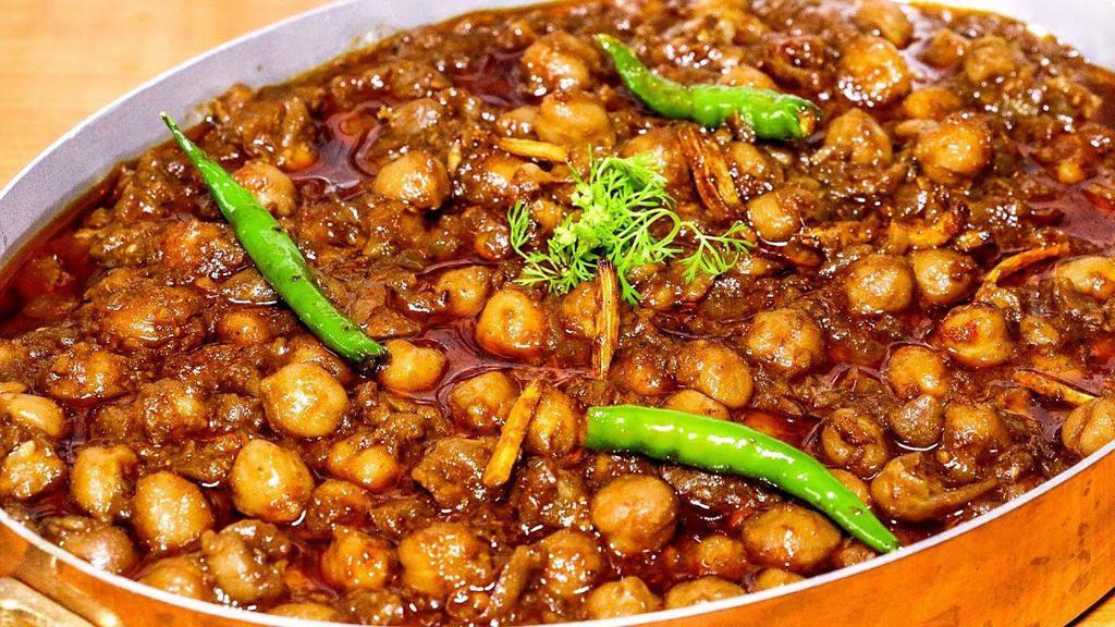 Chole Masala · Delicious chickpeas curry cooked in a special blend of Indian spices.