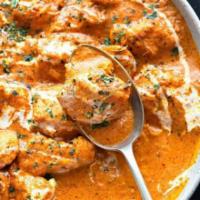 Butter Chicken · Boneless chicken cooked with with aromatic spices and herbs in buttery sauce.