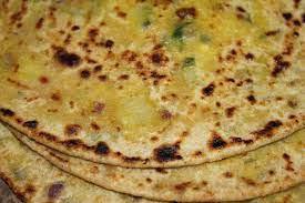 Desi Aloo Paratha · Perfectly formed paratha stuffed with potato.