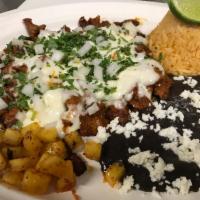 Pastor Platillo · Marinated pork. Variety of authentic Mexican dishes with beans, rice and fresh home-made, gl...
