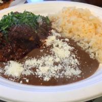 Barbacoa Platillo · Seasoned beef. Variety of authentic Mexican dishes with beans, rice and fresh home-made, glu...