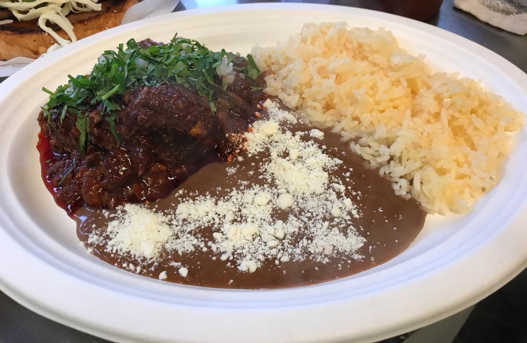 Barbacoa Platillo · Seasoned beef. Variety of authentic Mexican dishes with beans, rice and fresh home-made, gluten free corn tortillas.