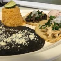 2 Carnitas Taco Plate · Pork roast. Cilantro, onion and radishes, with a side of rice and beans.