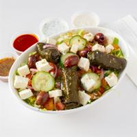 Greek Salad · Lettuce, tomato, cucumber, onion, olives, feta, grape leaves, red wine vinaigrette.