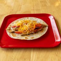 Chicken Fajita Taco · Grilled chicken fajita, grilled onion, grilled red pepper and Mexican cheese.