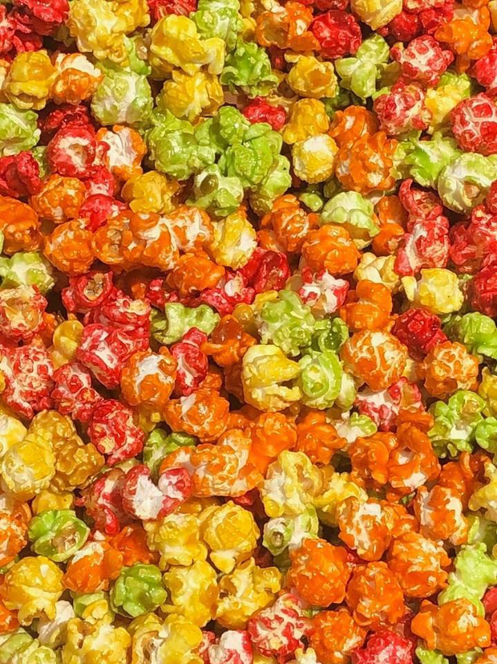 Sour Patch Kids Candy Coated Popcorn · A sour then sweet mix of candy coated popcorn.