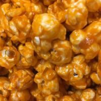 Orange flavored Candy Coated Popcorn · Tastes like orange