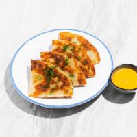 Scallion Pancake with Curry Sauce · Pan fried Chinese savory flat bread folded with scallions.
Served with yellow curry sauce.
C...