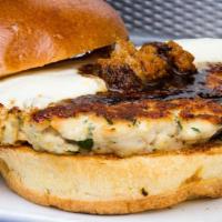 Chicken Burger · Fresh ground chicken, fresh mozzarella, fresh herbs and sun-dried tomato pesto aioli.