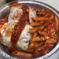 Eggplant Rollatini · Eggplant stuffed with ricotta cheese, baked and finished with marinara sauce and melted mozz...