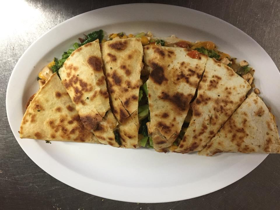 Veggie Quesadilla · Served with broccoli, mushrooms, tomatoes, onions, black olives and cheese.