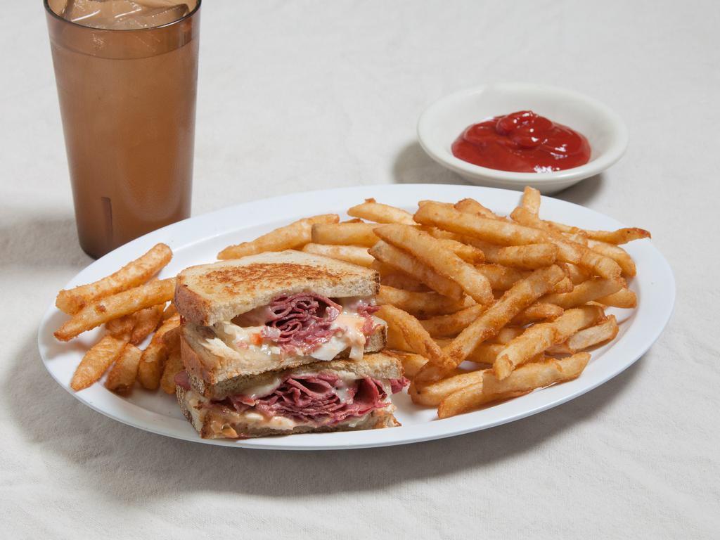 Old Fashioned Keystone Reuben · Grilled rye bread, Corned beef, melted Swiss, Thousand Island dressing, and Coleslaw. Served with french fries or house salad.