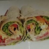 Keystone Wrap · Ham, turkey, lettuce, tomatoes and American cheese. Made on white flour or honey wheat torti...