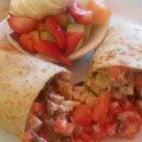 Chicken Ranch Wrap · Grilled tortilla stuffed with crushed ranch chicken, lettuce, tomato, and onions. Made on wh...