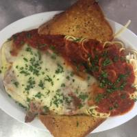 Eggplant Parmigiana · Served with tomato sauce and melted mozzarella cheese. Includes soup or tossed salad, garlic...