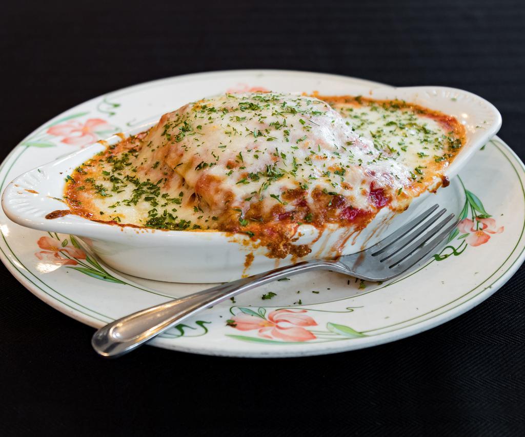 Homemade Lasagna · Includes soup or tossed salad, garlic bread and pasta. NOTE:  If choosing a soup, please type your choice in special instructions. Soup du Jour is listed in Soup description section.