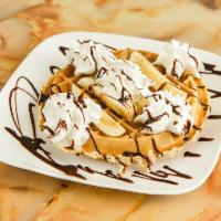 Banana Nut Waffle · Bananas and walnuts. Served with syrup and whipped cream & butter.