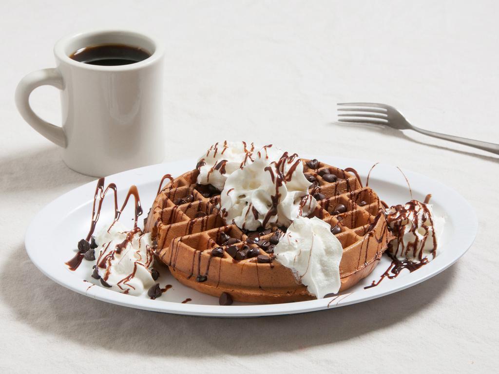 Chocolate Chips and Banana Waffle · Topped with fresh bananas and chocolate chips. Served with syrup and whipped cream & butter.