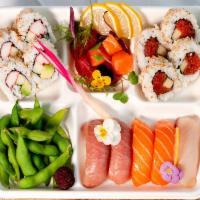 Popular Bento · Nigiri: 2pc of Tuna, 2pc of Salmon, 1pc of yellowtail,
Cut Rolls: 4 pc California Roll, 4pc ...