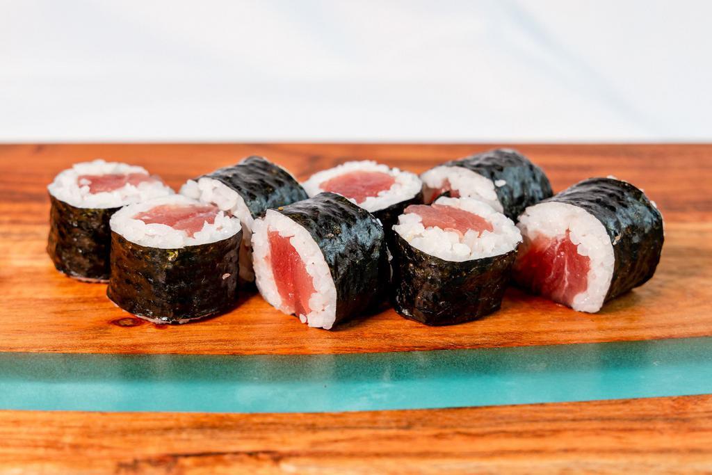 Tuna Roll · Tekka maki. Fresh tuna, sushi rice inside, seaweed outside.