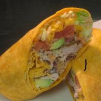 Turkey Avocado Wrap · A cheddar and jalapeno tortilla filled with sliced smoked turkey with chilled lettuce, hicko...