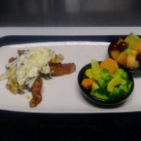 Baja Chicken Platter · A flat grilled chicken breast with honey mustard dressing, crisp smoked bacon, grilled onion...