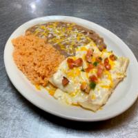 Enchilada Dinner · Your choice of (3) Enchiladas; Beef, Chicken and Cheese. Topped with sour cream sauce or che...