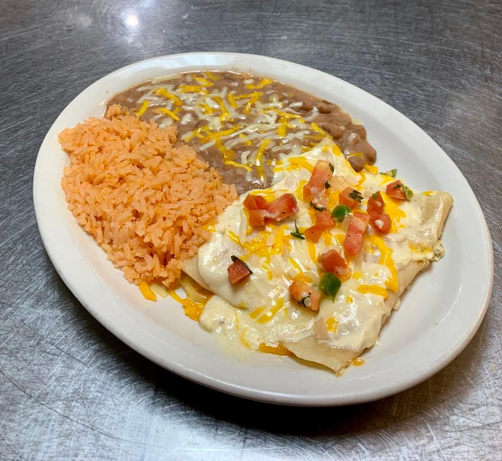 Enchilada Dinner · Your choice of (3) Enchiladas; Beef, Chicken and Cheese. Topped with sour cream sauce or cheese sauce and pico de gallo. Served with Rice and Beans.