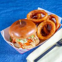 Buffalo Chicken Burger · Grilled or fried. Topped with lettuce, tomato, Buffalo sauce and ranch dressing.