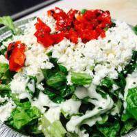 Somethingreek Salad · Romain Lettuce, Roasted red pepper, crumbled feta and our signature sauce.