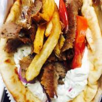 Gyro Sandwich · Slow roasted rotisserie beef and lamb.